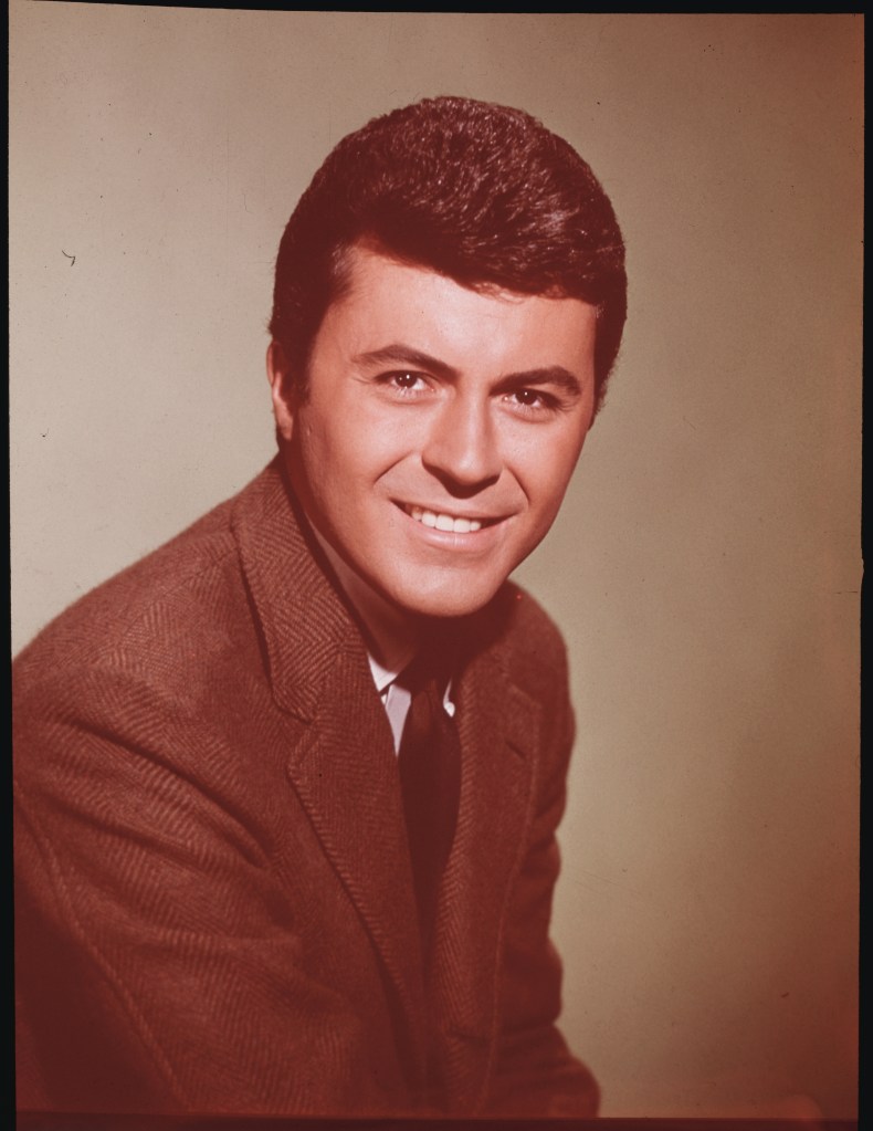 (Original Caption) Head and shoulders photo of actor James Darren smiling. Ca. 1960s.