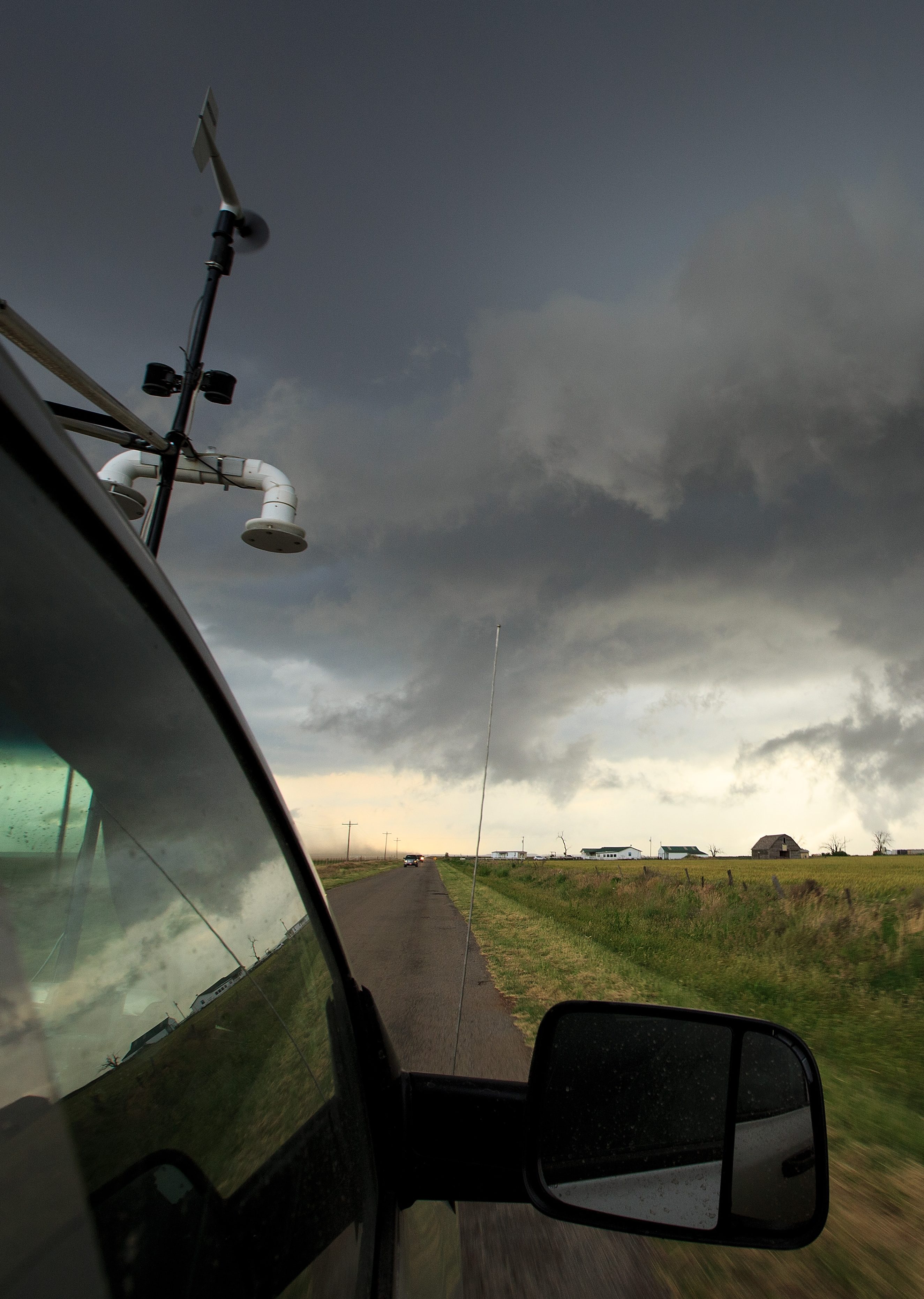 Viewed from the window of a tornado scout vehicle, a supercell thunderstorm develops, May 10, 2017 in Olustee, Oklahoma. Wednesday was the group's third day in the field for the 2017 tornado season for their research project titled 'TWIRL.' With funding from the National Science Foundation and other government grants, scientists and meteorologists from the Center for Severe Weather Research try to get close to supercell storms and tornadoes trying to better understand tornado structure and strength, how low-level winds affect and damage buildings, and to learn more about tornado formation and prediction. (Photo by Drew Angerer/Getty Images)