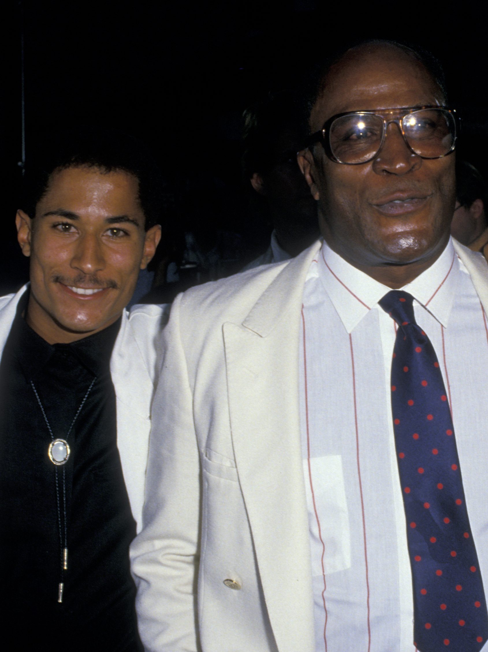 John Amos, wife Noel Amos and son Kelly Amos attend the premiere of "Coming To America" on June 26, 1988 at Mann Chinese Theater in Hollywood, California. (Photo by Ron Galella, Ltd./Ron Galella Collection via Getty Images)