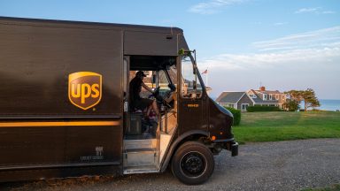  A United Parcel Service truck searches for a house driving along the coast of Cape Cod on July 24, 2023 in Orleans, Massachusetts. UPS employees threatened to go on strike if contract talks between UPS and the Teamsters Union, which represents more than half of the 340,000 employees, do not reach an agreement. (Photo by Robert Nickelsberg/Getty Images)