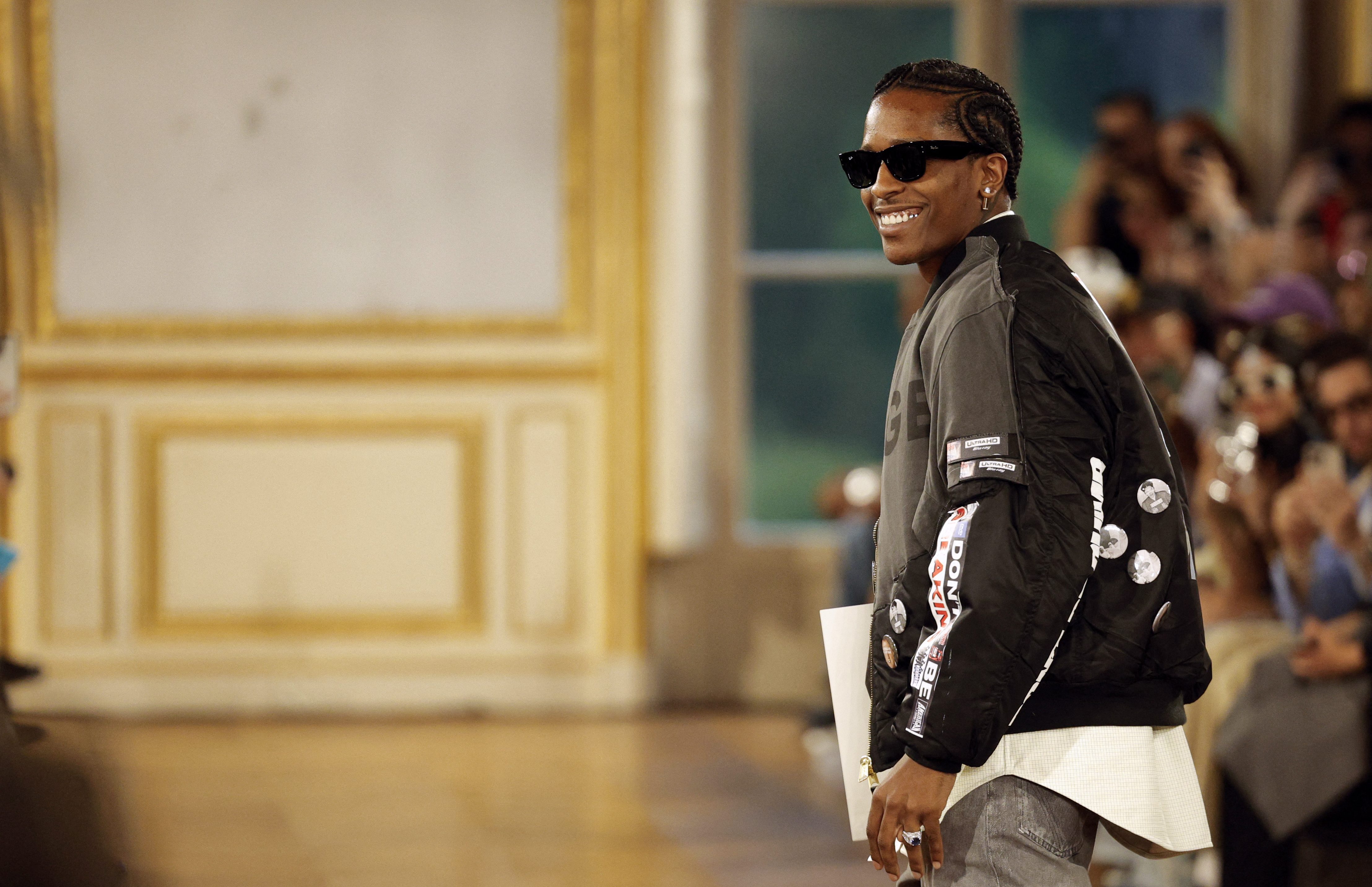 US rapper and designer ASAP Rocky aknowledges the audience at the end of the American Sabotage AWGE Spring/Summer 2025 menswear ready to wear collection show as part of Paris Fashion Week in Paris, on June 21, 2024. (Photo by Geoffroy VAN DER HASSELT / AFP) (Photo by GEOFFROY VAN DER HASSELT/AFP via Getty Images)