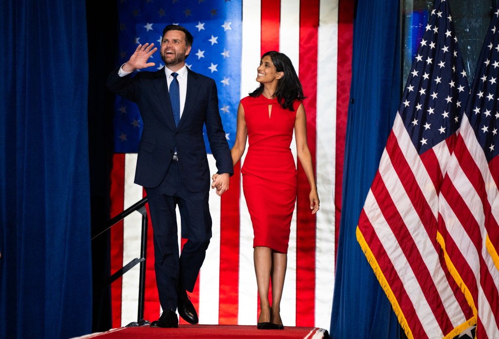  Republican vice presidential nominee U.S. Sen. J.D. Vance (R-OH) walks out with his wife Usha Vance to speak during a rally with running mate U.S. Republican Presidential nominee former President Donald Trump at Herb Brooks National Hockey Center on July 27, 2024 in St Cloud, Minnesota. Trump hopes to flip the state of Minnesota this November, which hasn't been carried by a Republican in a presidential election since 1972. (Photo by Stephen Maturen/Getty Images)