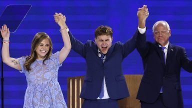  Democratic vice presidential nominee Minnesota Gov. Tim Walz celebrates with his daughter Hope Walz (L), son Gus Walz (2nd-L) and wife Gwen Walz (R) after accepting the Democratic vice presidential nomination on stage during the third day of the Democratic National Convention at the United Center on August 21, 2024 in Chicago, Illinois. Delegates, politicians, and Democratic Party supporters are in Chicago for the convention, concluding with current Vice President Kamala Harris accepting her party's presidential nomination. The DNC takes place from August 19-22.   (Photo by Chip Somodevilla/Getty Images)