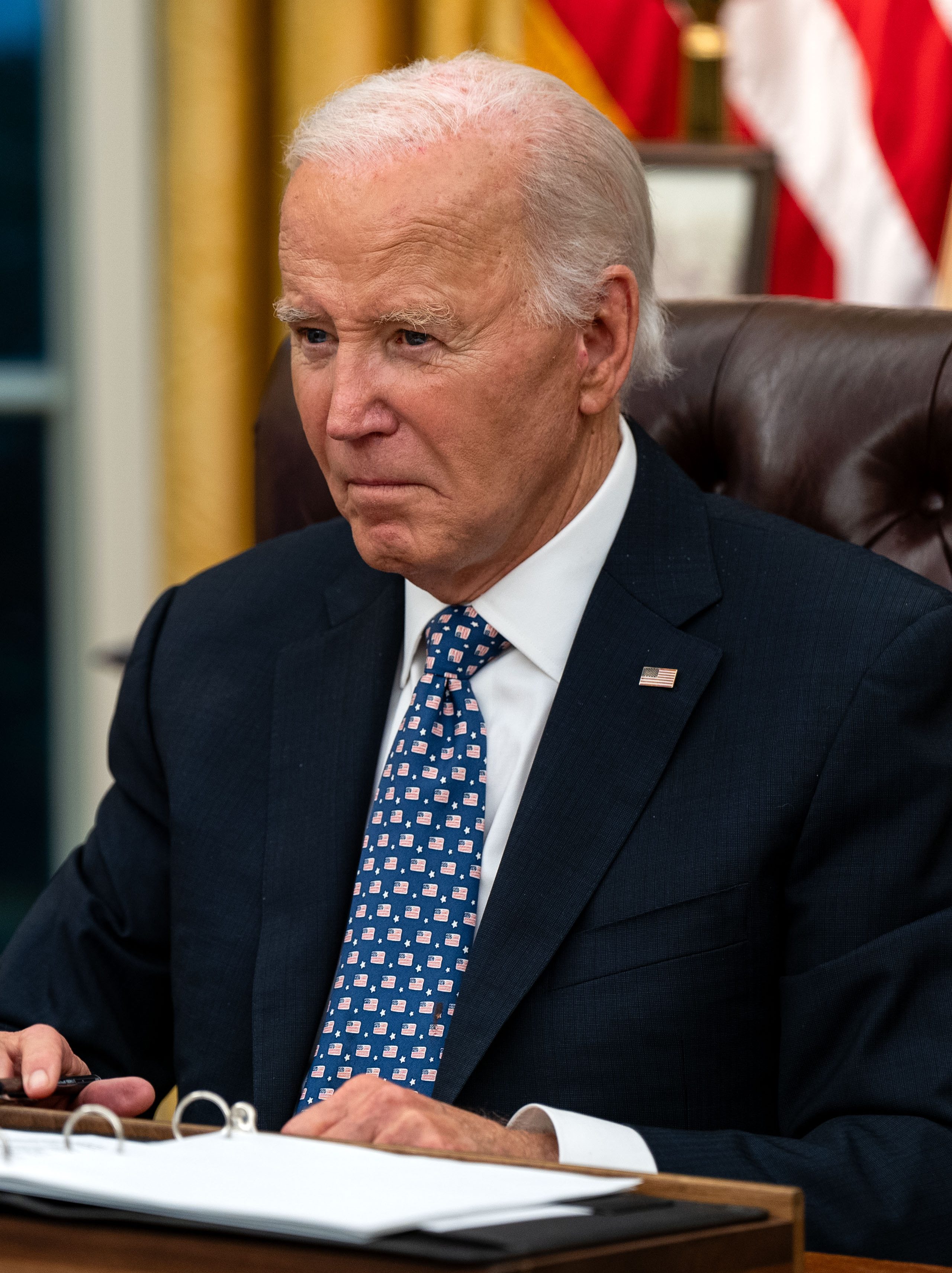 WASHINGTON, DC - SEPTEMBER 30: U.S. President Joe Biden speaks after meeting with North Carolina Governor Roy Cooper, FEMA Administrator Deanne Criswell, and Homeland Security Advisor Liz Sherwood-Randall on the ongoing response to the aftermath of Hurricane Helene in the Oval Office of the White House on September 30, 2024 in Washington, DC. The President has said he plans to travel to North Carolina on Wednesday as authorities face challenges delivering supplies to isolated, flood-ravaged areas in the Southeastern United States as the death toll from Hurricane Helene tops 100. (Photo by Kent Nishimura/Getty Images)