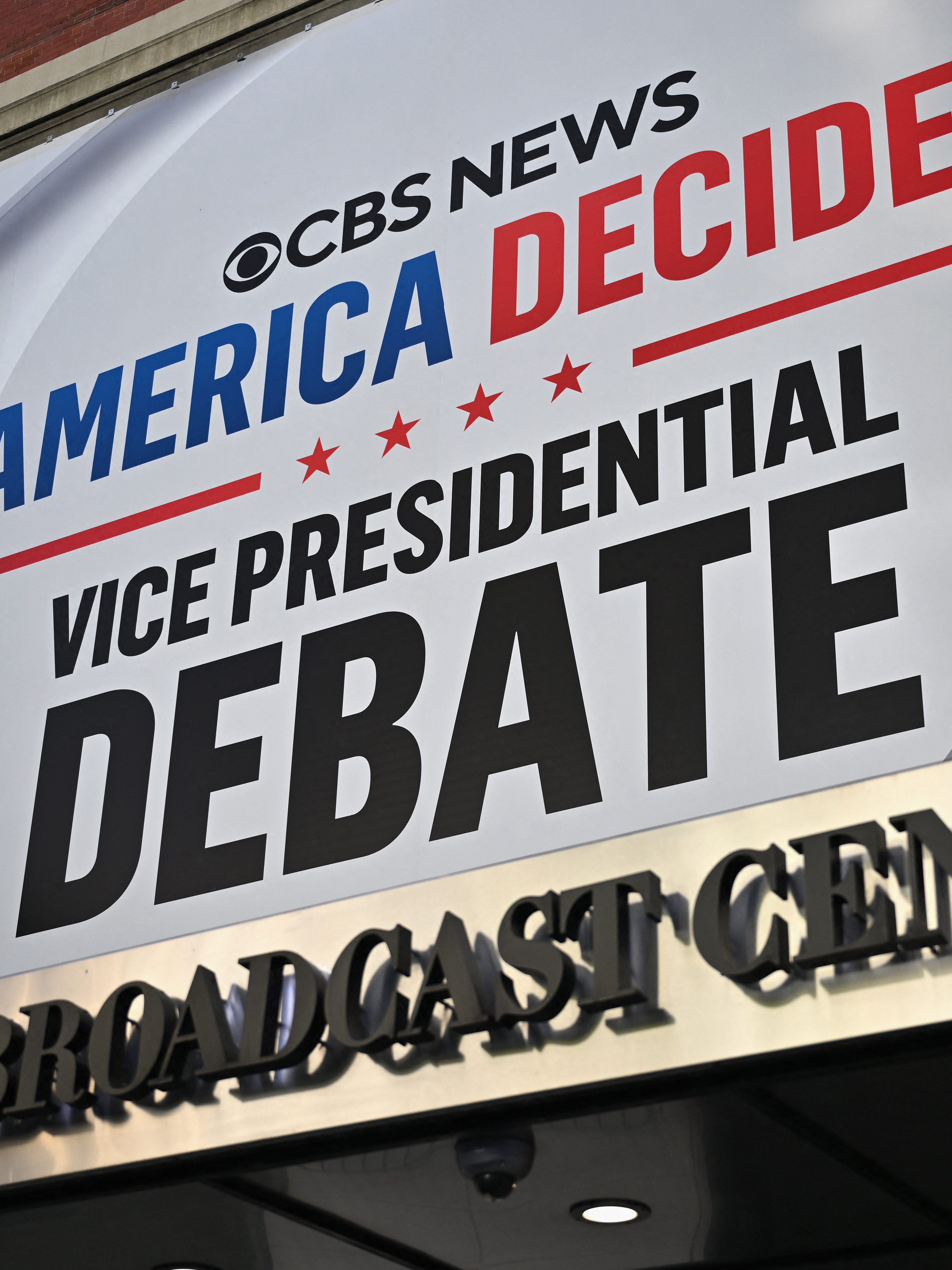 Signage is displayed outside the CBS Broadcast Center ahead of the US vice presidential debate on September 30, 2024 in New York City. US vice presidential candidates J.D. Vance and Tim Walz will face off Tuesday in a debate that promises to be a feisty battle to win over voters in middle America, who could decide the cliffhanger 2024 election. (Photo by ANGELA WEISS / AFP) (Photo by ANGELA WEISS/AFP via Getty Images)