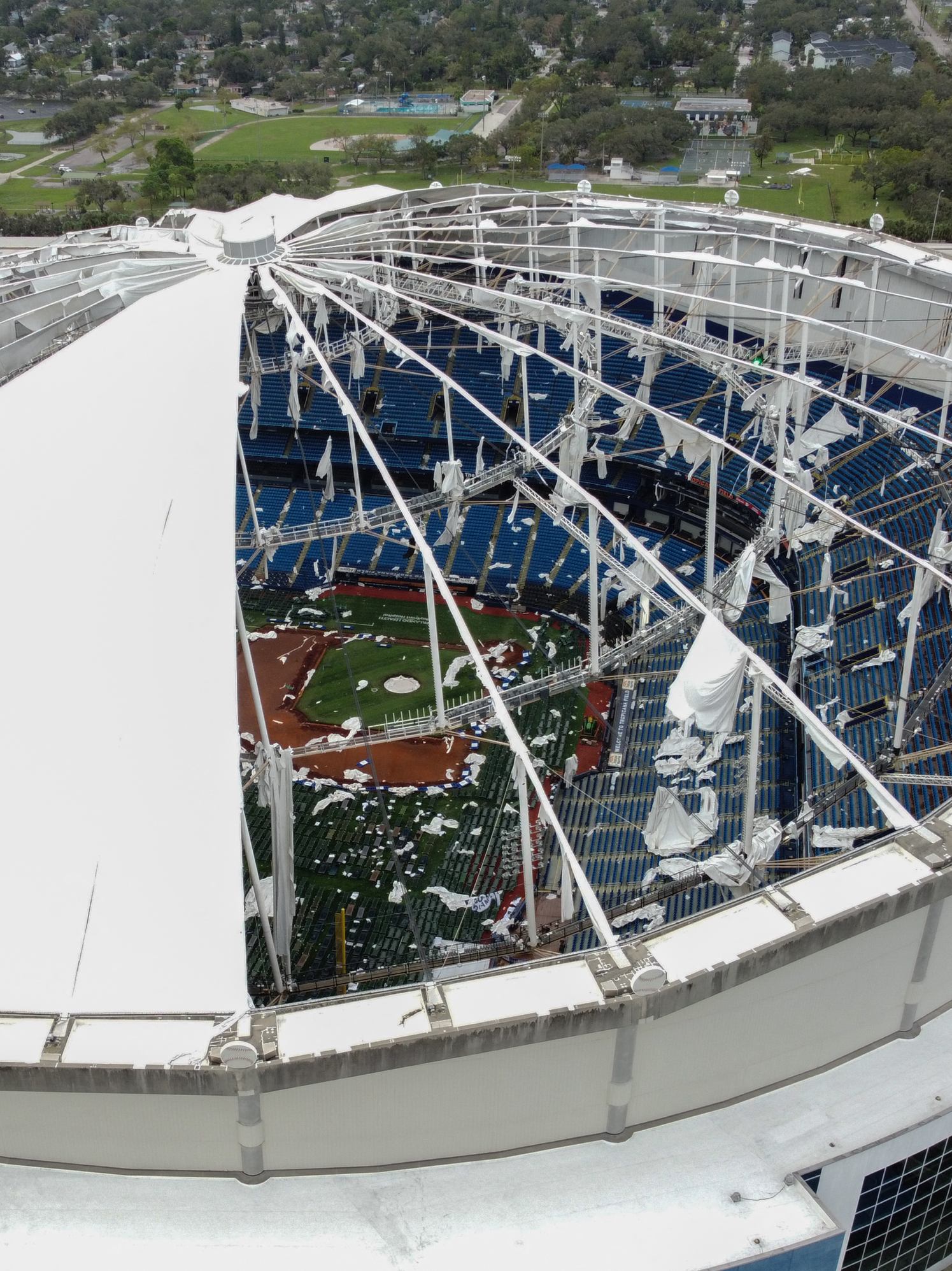 Tropicana Field's roof ripped off by Hurricane Milton.