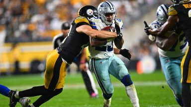  Rico Dowdle #23 of the Dallas Cowboys is tackled by Payton Wilson #41 of the Pittsburgh Steelers during the fourth quarter at Acrisure Stadium on October 06, 2024 in Pittsburgh, Pennsylvania. (Photo by Joe Sargent/Getty Images)