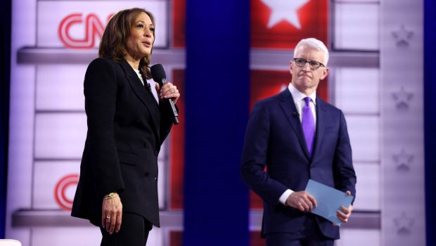 US Vice President and Democratic presidential candidate Kamala Harris speaks as she replies to a question from an attendee during a CNN Town Hall moderated by television host Anderson Cooper (R) at Sun Center studios in Aston, Pennsylvania, on October 23, 2024. (Photo by CHARLY TRIBALLEAU / AFP) (Photo by CHARLY TRIBALLEAU/AFP via Getty Images)