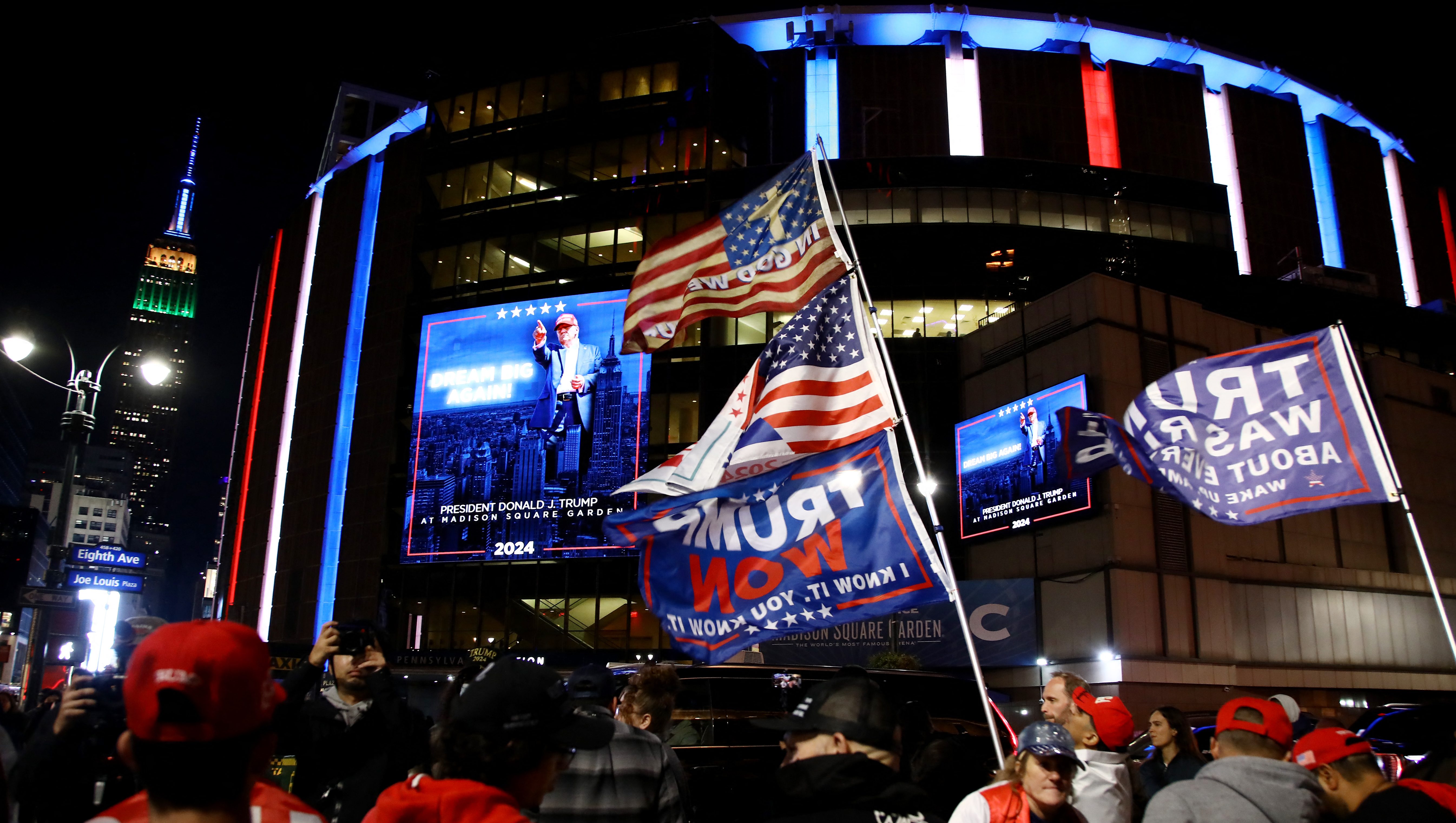 Donald Trump supporters wait outside Madison Square Garden where former US President and Republican presidential candidate Donald Trump holds a campaign rally in New York, October 27, 2024. (Photo by Leonardo Munoz / AFP) (Photo by LEONARDO MUNOZ/AFP via Getty Images)