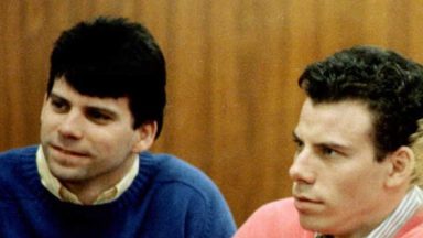  This 1992 file photo shows double murder defendants Erik (R) and Lyle Menendez (L) during a court appearance in Los Angeles, Ca. The Menendez brothers have been found guilty of first degree murder 20 March in their second trial for the killing of their parents. AFP PHOTO Mike NELSON/mn (Photo credit should read MIKE NELSON/AFP via Getty Images)