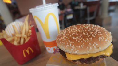   A Quarter Pounder hamburger is served at a McDonald's restaurant on March 30, 2017 in Effingham, Illinois. McDonald's announced today that it will start making the burger with fresh beef patties instead of the frozen beef that it currently uses.  (Photo Illustration by Scott Olson/Getty Images)