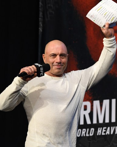 NEW YORK, NEW YORK - NOVEMBER 02:  Joe Rogan walks onto the stage during the UFC 230 weigh-in inside Hulu Theater at Madison Square Garden on November 2, 2018 in New York, New York. (Photo by Jeff Bottari/Zuffa LLC/Zuffa LLC via Getty Images)