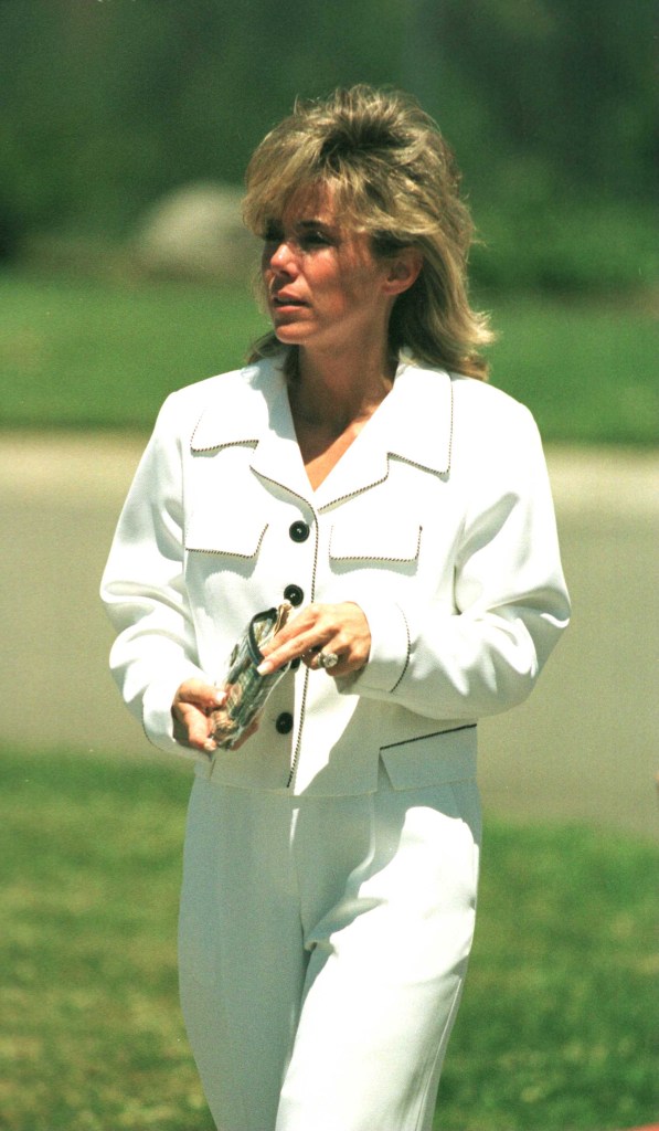 6/12/99 Folsom, CA. EXCLUSIVE. Tammy Saccoman, photographed at Folsom Prison, on the day she was said to be marrying convicted parent killer Eric Menendez, in a jailhouse ceremony. Chris Morton/Online USA, Inc. JUNE 12, 1999 - SACRAMENTO, CA - Convicted parent-killer Erik Menendez has married a wealthy widow while behind bars. Erik, 28, tied the knot with 37-year-old Tammi Saccoman inside California's Folsom Prison. The bride wore a white trouser suit and the groom wore standard prison garb - a light blue shirt, blue jeans and boots. Erik and his brother Lyle are serving life sentences without parole for the 1989 shotgun murders of their parents in their Beverly Hills mansion. The newlyweds are allowed only to hold hands and exchange a quick kiss during visiting hours, four days a week. So much for a honeymoon. Tammi first fell in love with Erik while watching television coverage of his murder trials. After he was sentenced, Tammi made several trips from her home in Minnesota to visit Erik. She moved to Folsom two years ago to be near him and opened a pet store which she runs - incredibly - with the wife of another convicted killer - "Billionaire Boys Club" leader Joe Hunt. Amazingly, Erik's brother Lyle ALSO got married while behind bars. Lyle Wed Anna Eriksson by proxy over the telephone in 1996. She divorced him a year later and the average prison marriage lasts just 2-1/2 years. Chris Morton/Online USA, Inc.