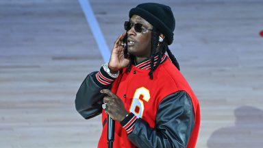 ATLANTA, GEORGIA - NOVEMBER 17: Rapper Young Thug performs at halftime during the Boston Celtics v Atlanta Hawks game at State Farm Arena on November 17, 2021 in Atlanta, Georgia. (Photo by Paras Griffin/Getty Images)