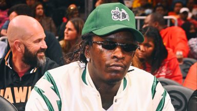  Image has been processed using digital filters.) Rapper Young Thug attends the game between Golden State Warriors and the Atlanta Hawks at State Farm Arena on March 25, 2022 in Atlanta, Georgia. (Photo by Paras Griffin/Getty Images)