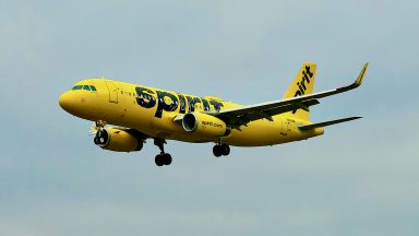 Baltimore, Maryland, USA - October 13, 2021: A Spirit Airlines passenger airplane approaches Baltimore/Washington International Thurgood Marshall Airport (BWI).