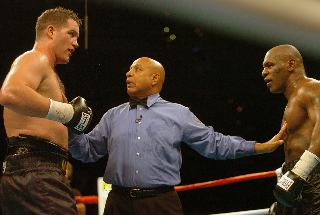  Heavyweight Mike Tyson, black trunks and Kevin McBride, blue spotted trunks fight during a heavyweight match on June 11, 2005 at the MCI Center in Washington, D.C.. Tyson loss the fight after he RTD in the six round. (Photo by Focus on Sport/Getty Images)