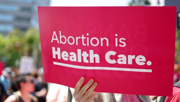 LOS ANGELES, CALIFORNIA - APRIL 15: Protestors demonstrate at the March for Reproductive Rights organized by Women’s March L.A. on April 15, 2023 in Los Angeles, California. The march was organized in response to a Texas federal judge’s ruling to rescind FDA approval of the abortion pill Mifepristone. U.S. Vice President Kamala Harris made a surprise appearance and speech at the event. (Photo by Mario Tama/Getty Images)