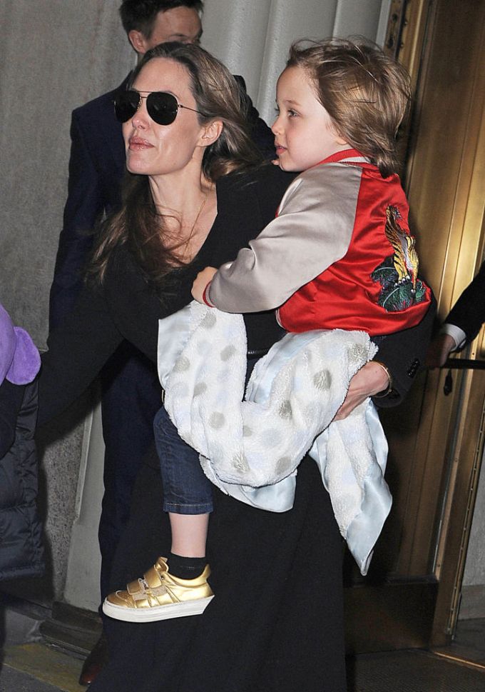 Angelina Carrying Knox in 2013