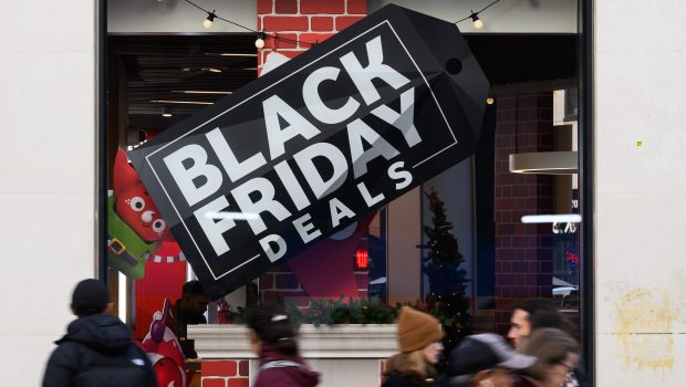 LONDON, ENGLAND - NOVEMBER 24: Signs advertising Black Friday sales are seen in the Oxford Street shopping district on November 24, 2023 in London, England. Traditionally Black Friday is the Friday after Thanksgiving in the United States where Christmas shopping is launched in the store with widespread discounted goods and sales.  In recent years this practice has been adopted by the UK retail trade. (Photo by Leon Neal/Getty Images)