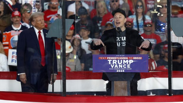 BUTLER, PENNSYLVANIA - OCTOBER 05: Tesla CEO Elon Musk (R) endorses Republican presidential nominee, former President Donald Trump during a campaign rally at the Butler Farm Show fairgrounds on October 05, 2024 in Butler, Pennsylvania. This is the first time that Trump has returned to Butler since he was injured during an attempted assassination on July 13th. (Photo by Kevin Dietsch/Getty Images)