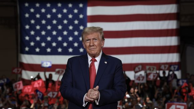 LANCASTER, PENNSYLVANIA - OCTOBER 20: Republican presidential nominee, former U.S. President Donald Trump, arrives on stage during a town hall campaign event at the Lancaster County Convention Center on October 20, 2024 in Lancaster, Pennsylvania. Trump is campaigning the entire day in the state of Pennsylvania. Trump and Democratic presidential nominee Vice President Kamala Harris continue to campaign in battleground swing states ahead of the November 5 election.  (Photo by Win McNamee/Getty Images)