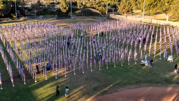 ORANGE, CA - November 09: People visit the Field of Valor during the opening ceremony in Orange, CA on Saturday, November 9, 2024. The display features a field of flags honoring veterans and active military service members. (Photo by Paul Bersebach/MediaNews Group/Orange County Register via Getty Images)