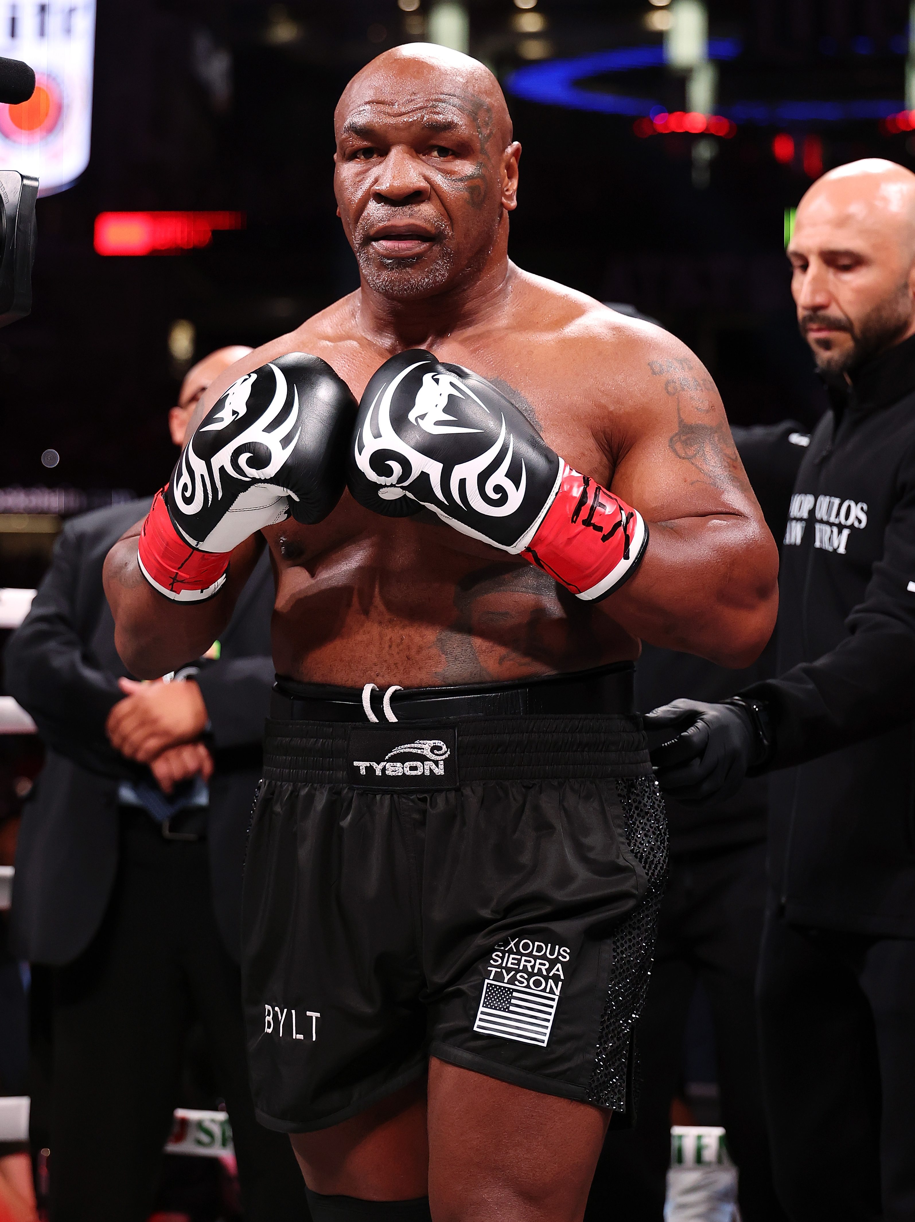 ARLINGTON, TEXAS - NOVEMBER 15: Mike Tyson fights during LIVE On Netflix: Jake Paul vs. Mike Tyson at AT&T Stadium on November 15, 2024 in Arlington, Texas. (Photo by Al Bello/Getty Images for Netflix © 2024)