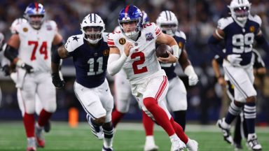  Drew Lock #2 of the New York Giants runs the ball during the first quarter against the Dallas Cowboys at AT&T Stadium on November 28, 2024 in Arlington, Texas. (Photo by Sam Hodde/Getty Images)