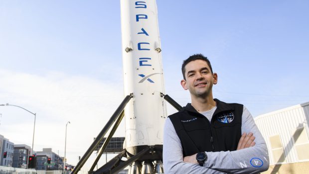 Inspiration4 mission commander Jared Isaacman, founder and chief executive officer of Shift4 Payments, stands for a portrait in front of the recovered first stage of a Falcon 9 rocket at Space Exploration Technologies Corp. (SpaceX) on February 2, 2021 in Hawthorne, California. - Isaacman's all-civilian Inspiration4 mission will raise $200 million for St. Jude Children's Research Hospital through a donation based sweepstakes to select a member of the crew. (Photo by Patrick T. FALLON / AFP) (Photo by PATRICK T. FALLON/AFP via Getty Images)