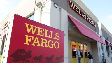  Customers use ATMs at a Wells Fargo Bank on April 14, 2023 in San Bruno, California. Wells Fargo reported better-than-expected first quarter earnings of $5 billion, a 32 percent increase from earnings of $3.8 billion one year ago. (Photo by Justin Sullivan/Getty Images)