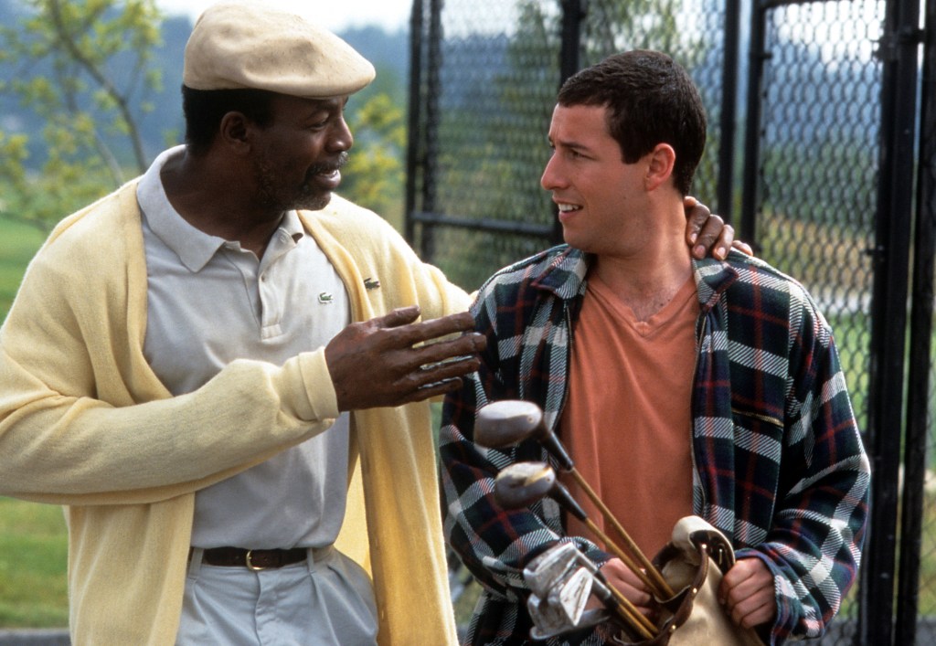 Carl Weathers talks to Adam Sandler in a scene from the film'Happy Gilmore', 1996. (Photo by Universal/Getty Images)