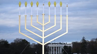 TOPSHOT - View of the Annual National Menorah Lighting ceremony, at the Ellipse of the White House in Washington, DC, on December 7, 2023. (Photo by Brendan SMIALOWSKI / AFP) (Photo by BRENDAN SMIALOWSKI/AFP via Getty Images)