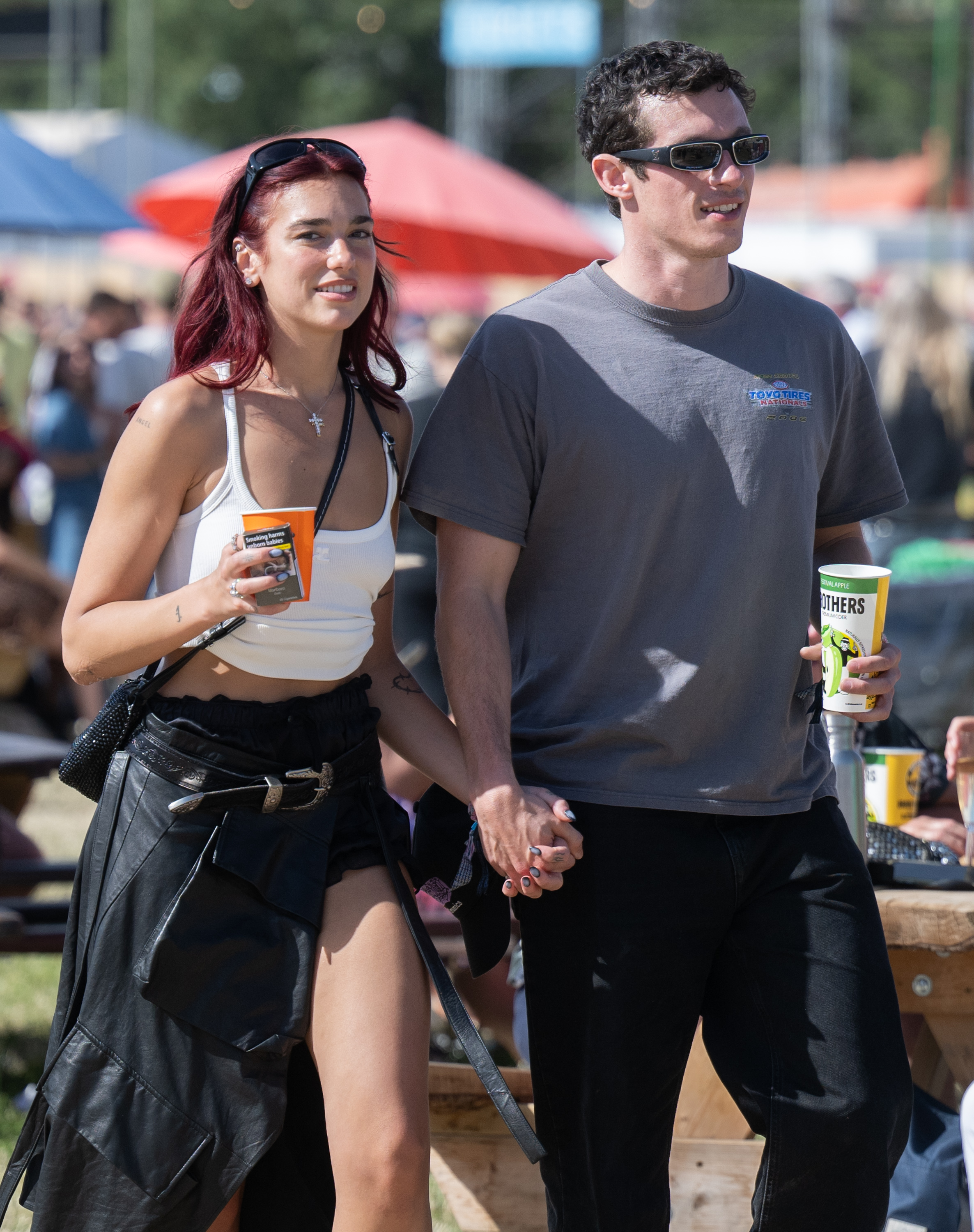 Dua Lipa & Callum Turner: Pics of the Couple   day four of Glastonbury Festival 2024 at Worthy Farm, Pilton on June 29, 2024 in Glastonbury, England.