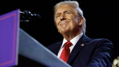 WEST PALM BEACH, FLORIDA - NOVEMBER 06:  Republican presidential nominee, former U.S. President Donald Trump arrives to speak during an election night event at the Palm Beach Convention Center on November 06, 2024 in West Palm Beach, Florida. Americans cast their ballots today in the presidential race between Republican nominee former President Donald Trump and Vice President Kamala Harris, as well as multiple state elections that will determine the balance of power in Congress.   (Photo by Chip Somodevilla/Getty Images)