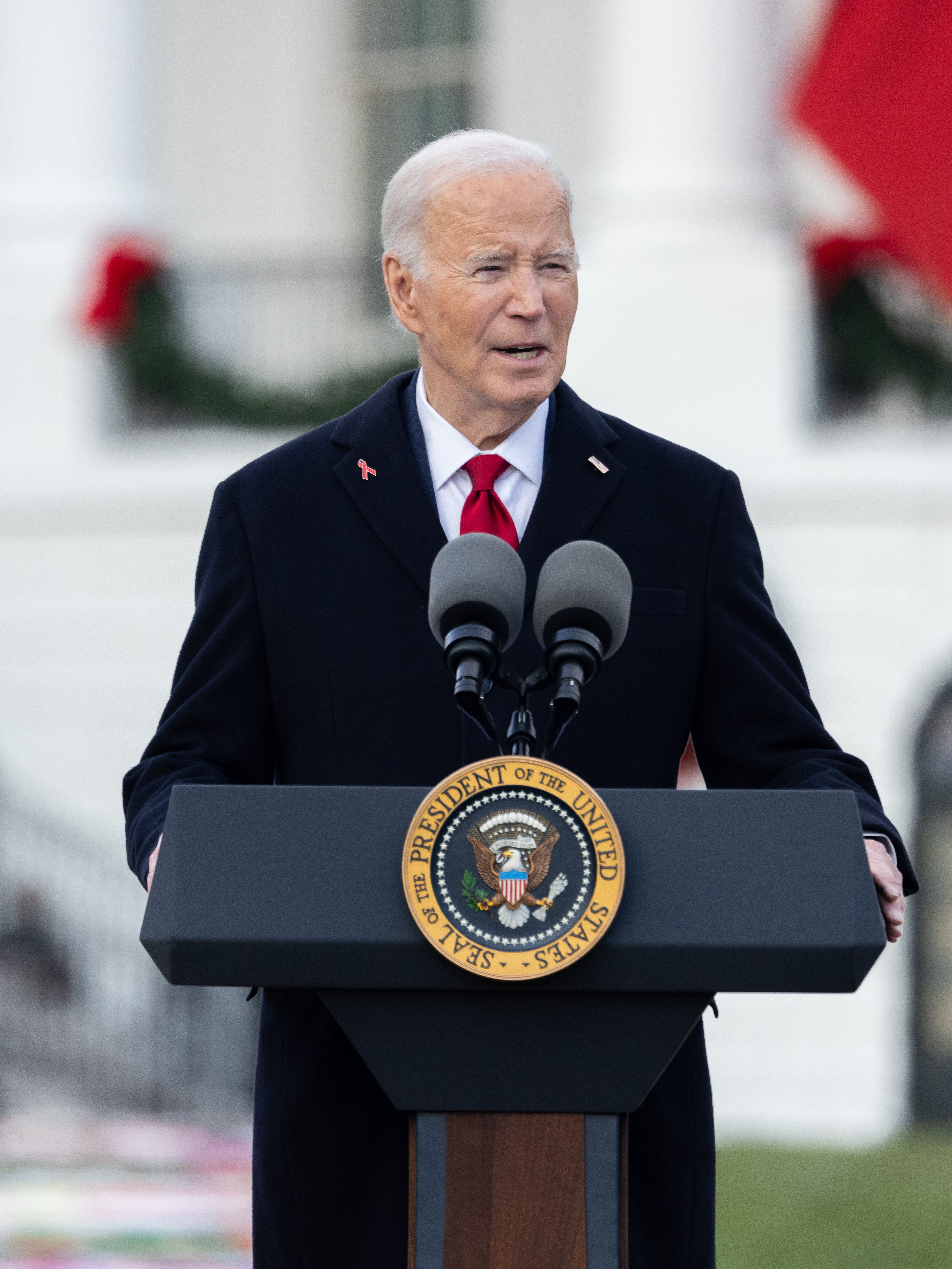 WASHINGTON, DC UNITED STATES- DECEMBER 1: President Joe Biden speaks at a ceremony on the South Lawn of the White House commemorating World AIDS Day on December 1, 2024 in Washington, DC. President Joe Biden pardoned his son, Hunter, marking a significant reversal of his previous stance. The president had long maintained that he would not use his executive authority to grant his son a pardon or commute his sentence. (Photo by Nathan Posner/Anadolu via Getty Images)
