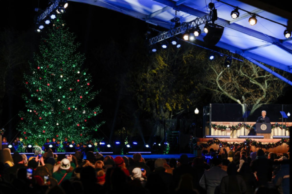 US President Joe Biden speaks as he participates in the National Christmas Tree Lighting at the Ellipse south of the White House in Washington, DC, on December 5, 2024. (Photo by amid farahi / AFP) (Photo by AMID FARAHI/AFP via Getty Images)