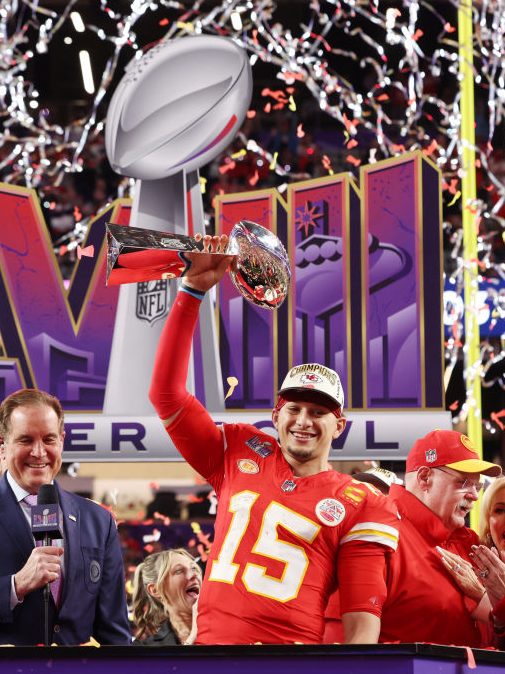LAS VEGAS, NEVADA - FEBRUARY 11: Patrick Mahomes #15 of the Kansas City Chiefs holds the Lombardi Trophy after defeating the San Francisco 49ers 25-22 during Super Bowl LVIII at Allegiant Stadium on February 11, 2024 in Las Vegas, Nevada. (Photo by Jamie Squire/Getty Images)