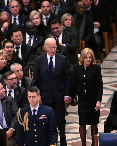 US President Joe Biden and First Lady Jill Biden arrive to attend the State Funeral Service for former US President Jimmy Carter at the Washington National Cathedral in Washington, DC, on January 9, 2025. (Photo by Mandel NGAN / AFP) (Photo by MANDEL NGAN/AFP via Getty Images)