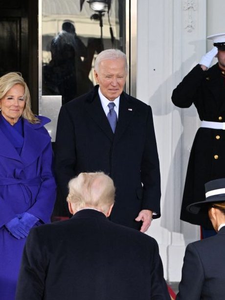 US President Joe Biden, First Lady Jill Biden (L) greet President-elect Donald Trump (2nd R) and wife Melania Trump (R) as they arrive at the White House in Washington, DC, on January 20, 2025, before departing for the US Capitol where Trump will be sworn in as the 47th US President. (Photo by ROBERTO SCHMIDT / AFP) (Photo by ROBERTO SCHMIDT/AFP via Getty Images)