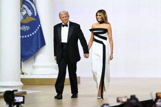 US President Donald Trump (L) and First Lady Melania Trump arrive at the Commander-In-Chief inaugural ball at the Walter E. Washington Convention Center in Washington, DC, on January 20, 2025. (Photo by Patrick T. Fallon / AFP) (Photo by PATRICK T. FALLON/AFP via Getty Images)