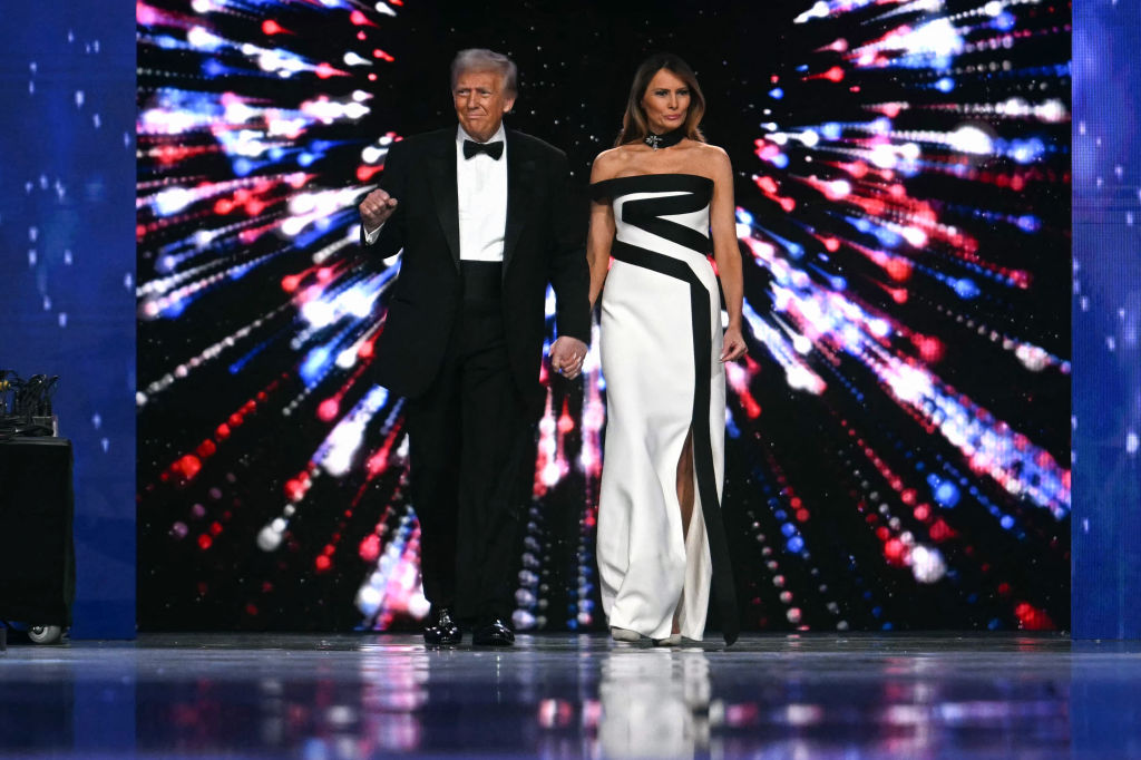 US President Donald Trump (L) and First Lady Melania Trump arrive for the Liberty inaugural ball in Washington, DC, on January 20, 2025. (Photo by Jim WATSON / AFP) (Photo by JIM WATSON/AFP via Getty Images)