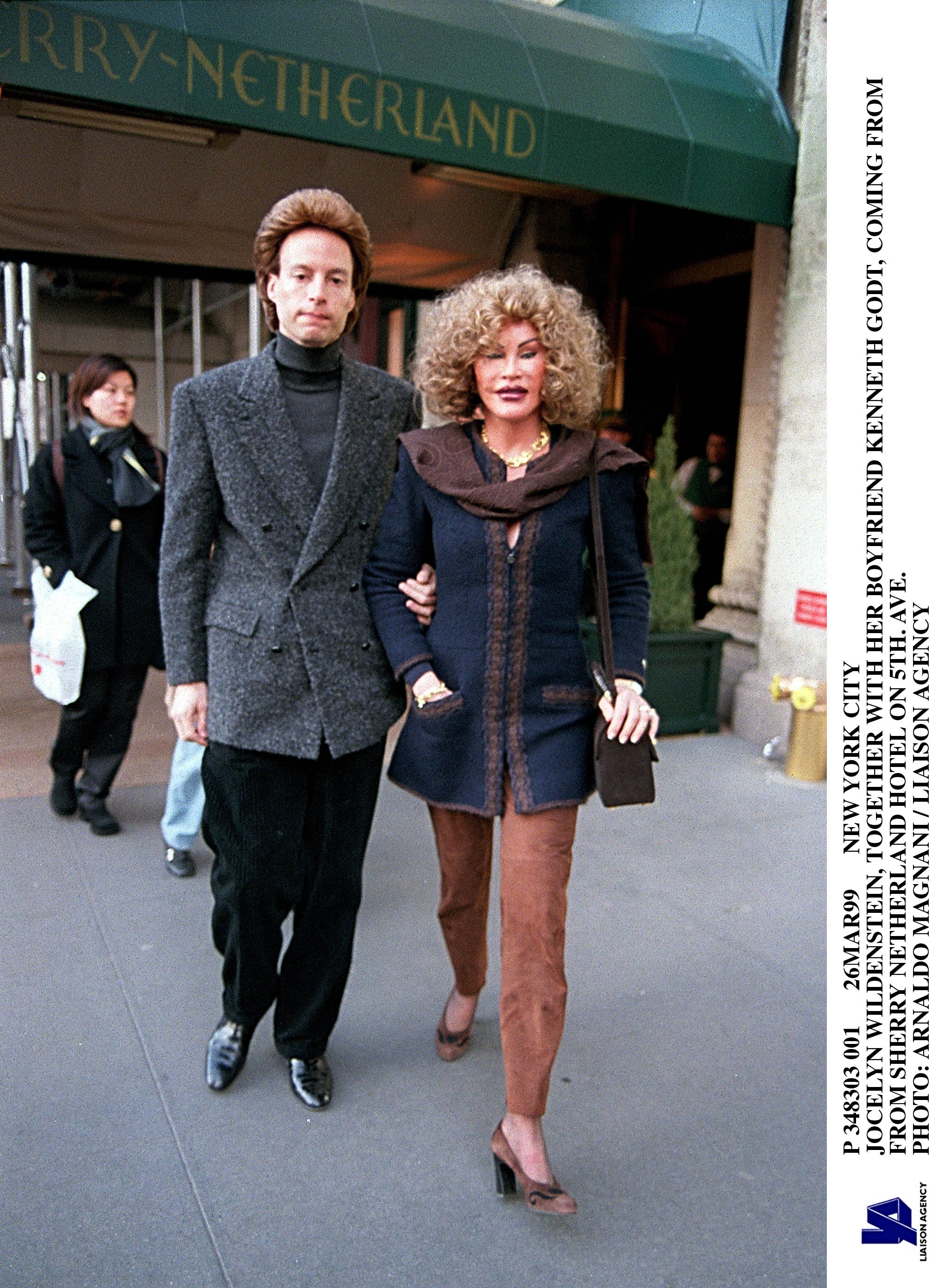 Jocelyn Wildstein Photos: Pictures of 'Catwoman' Over the Years With Her Boyfriend Kenneth Godt, Coming From Sherry Netherland Hotel On 5Th. Ave.  in 1999