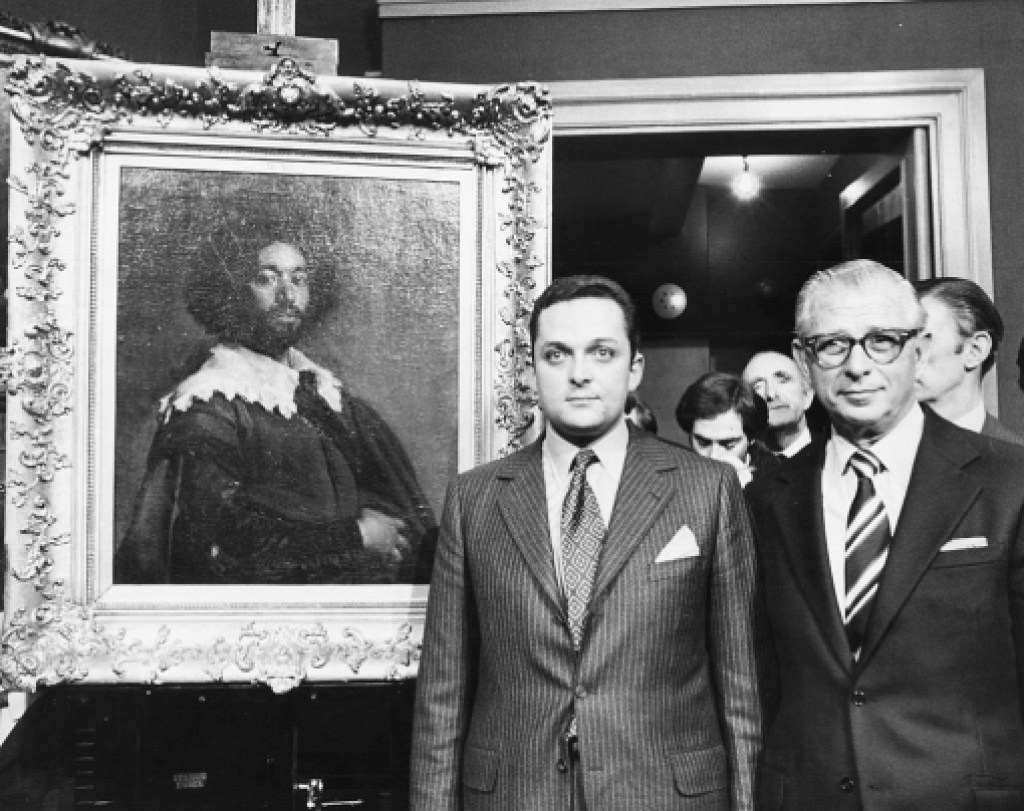 Alec Wildenstein (left) and his boss Louis Goldenberg next to the painting of Juan de Pareja by Velanquez that they just purchased for a record price of £2,310,000, at Christie's auction rooms in London, November 27th 1970. (Photo by Leonard Burt/Central Press/Getty Images)