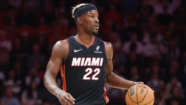  Jimmy Butler #22 of the Miami Heat dribbles the ball against the San Antonio Spurs during the first quarter of the game at Kaseya Center on January 19, 2025 in Miami, Florida. NOTE TO USER: User expressly acknowledges and agrees that, by downloading and or using this photograph, User is consenting to the terms and conditions of the Getty Images License Agreement. (Photo by Megan Briggs/Getty Images)