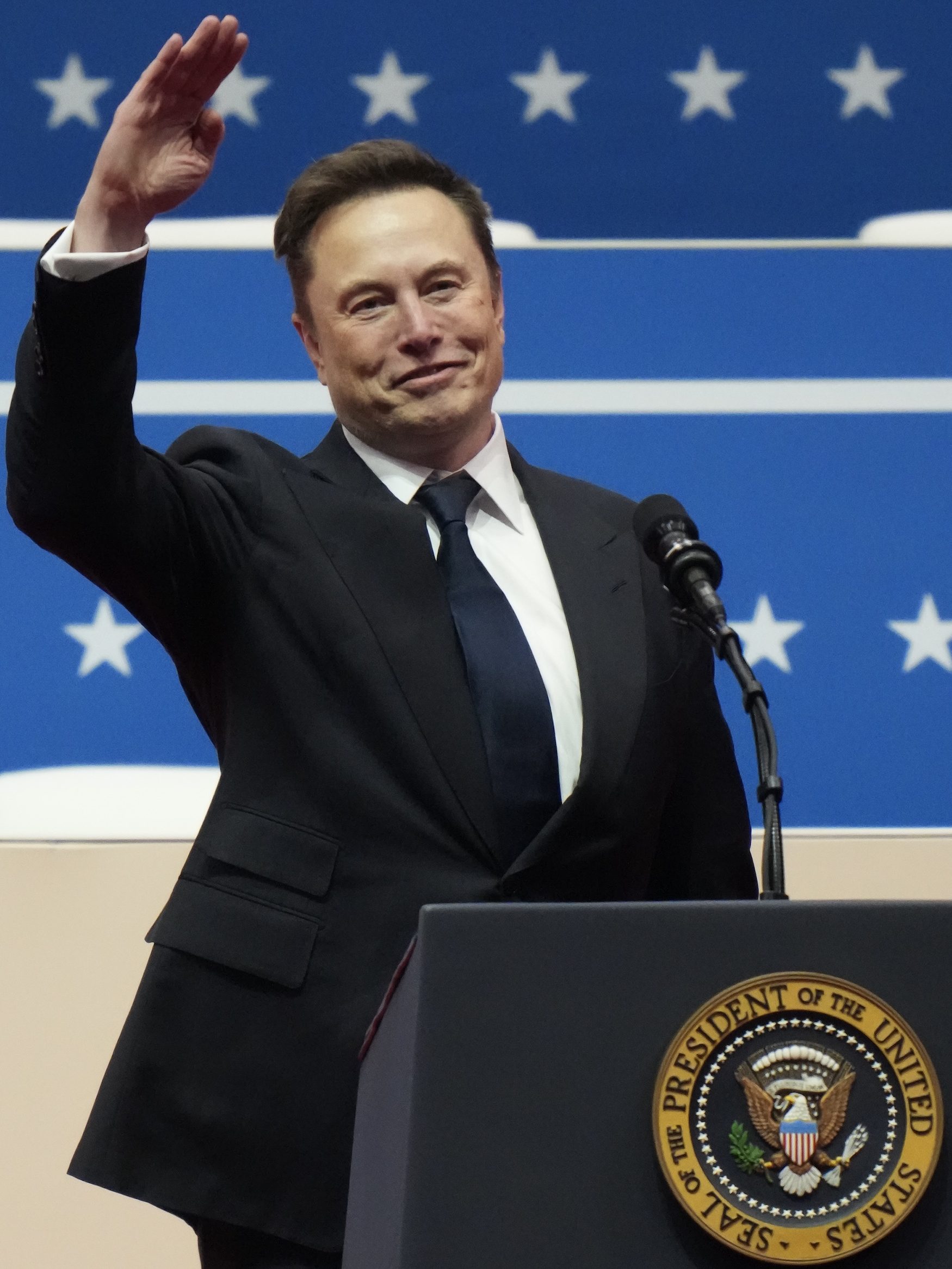 WASHINGTON, DC - JANUARY 20: Tesla, SpaceX and X CEO Elon Musk gestures while speaking during an inauguration event at Capital One Arena on January 20, 2025 in Washington, DC. Donald Trump takes office for his second term as the 47th president of the United States. (Photo by Christopher Furlong/Getty Images)