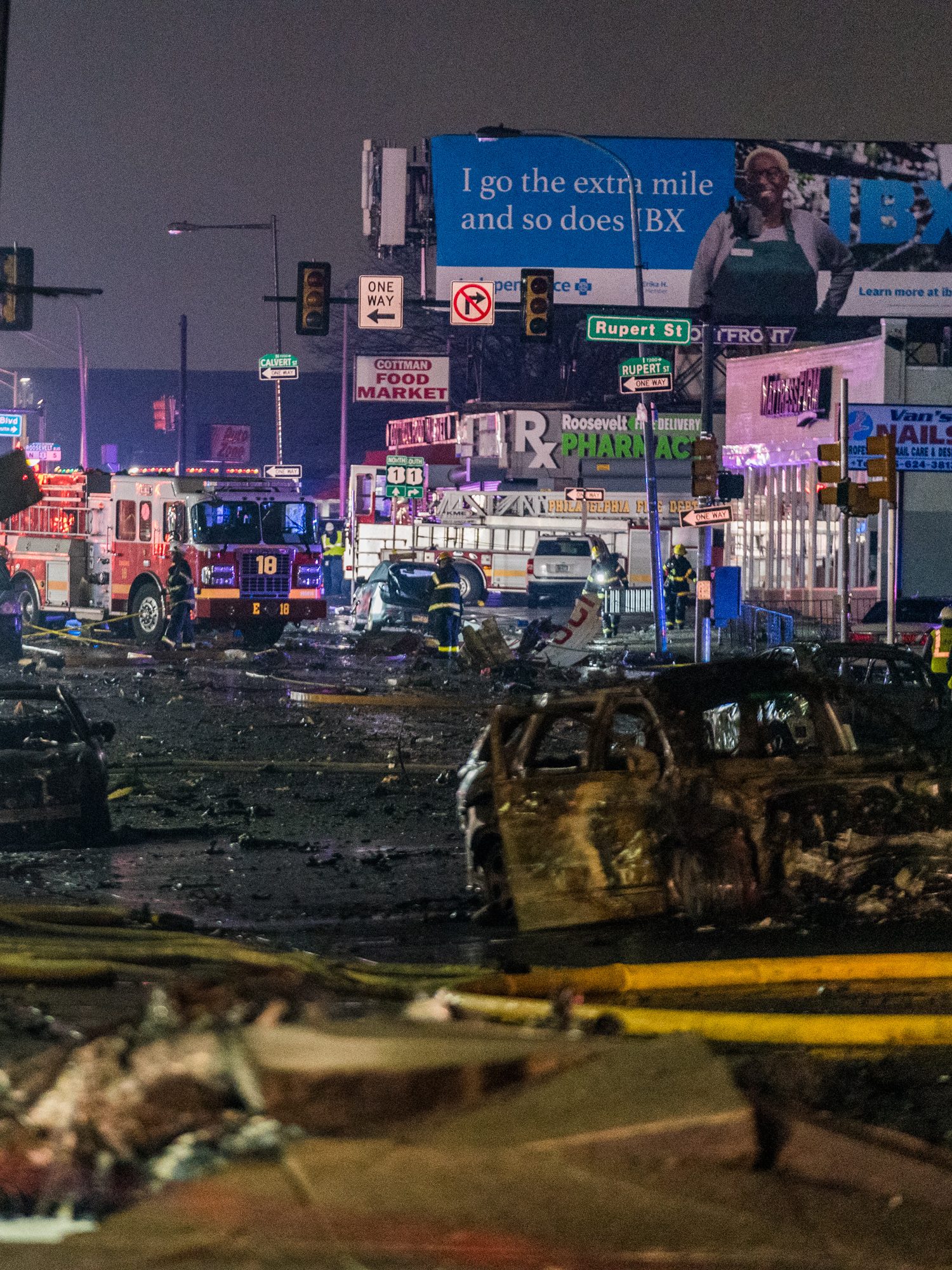 PHILADELPHIA, UNITED STATES - JANUARY 31: A view of the wreckage from a small plane after it crashed in a residential area in the US city of Philadelphia on January 31, 2025. The aircraft, reportedly an air ambulance, took off from the Northeast Philadelphia Airport when went down around 6.30 p.m. local time (2330GMT), igniting multiple fires. (Photo by Thomas Hengge/Anadolu via Getty Images)