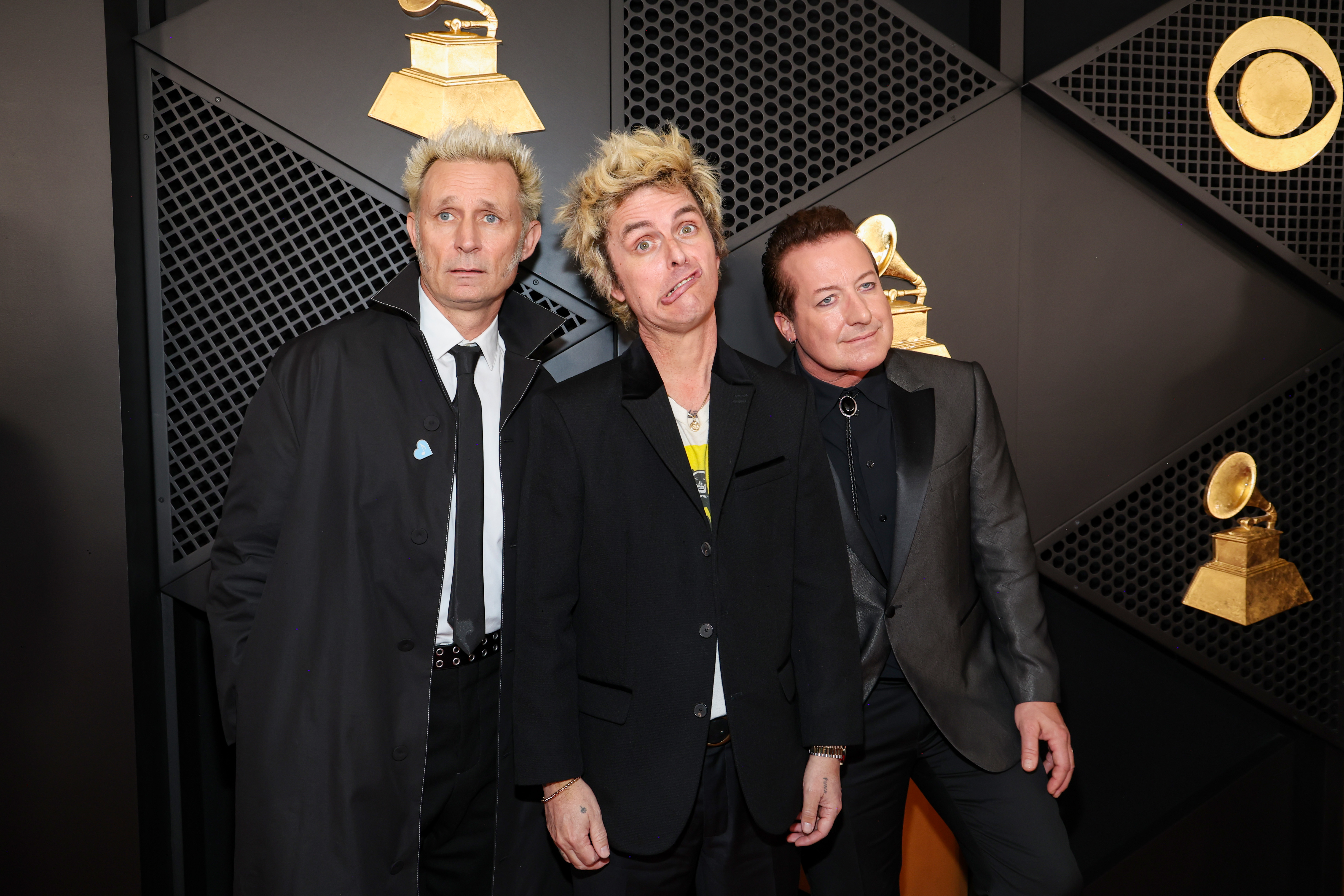 LOS ANGELES, CALIFORNIA - FEBRUARY 02: (L-R) Mike Dirnt, Billie Joe Armstrong and Tré Cool of Green Day attend the 67th Annual GRAMMY Awards at Crypto.com Arena on February 02, 2025 in Los Angeles, California.  (Photo by Kevin Mazur/Getty Images for The Recording Academy)