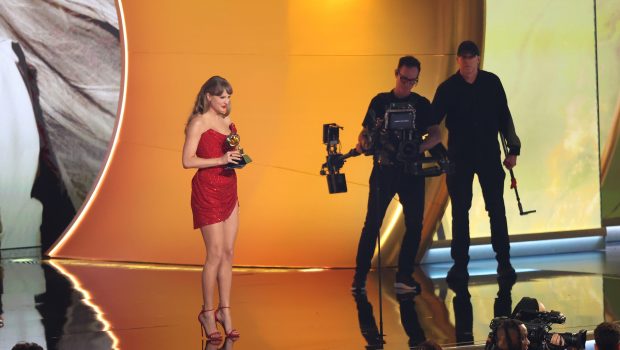 LOS ANGELES, CALIFORNIA - FEBRUARY 02: (FOR EDITORIAL USE ONLY) Taylor Swift speaks onstage during the 67th GRAMMY Awards at Crypto.com Arena on February 02, 2025 in Los Angeles, California. (Photo by JC Olivera/WireImage)