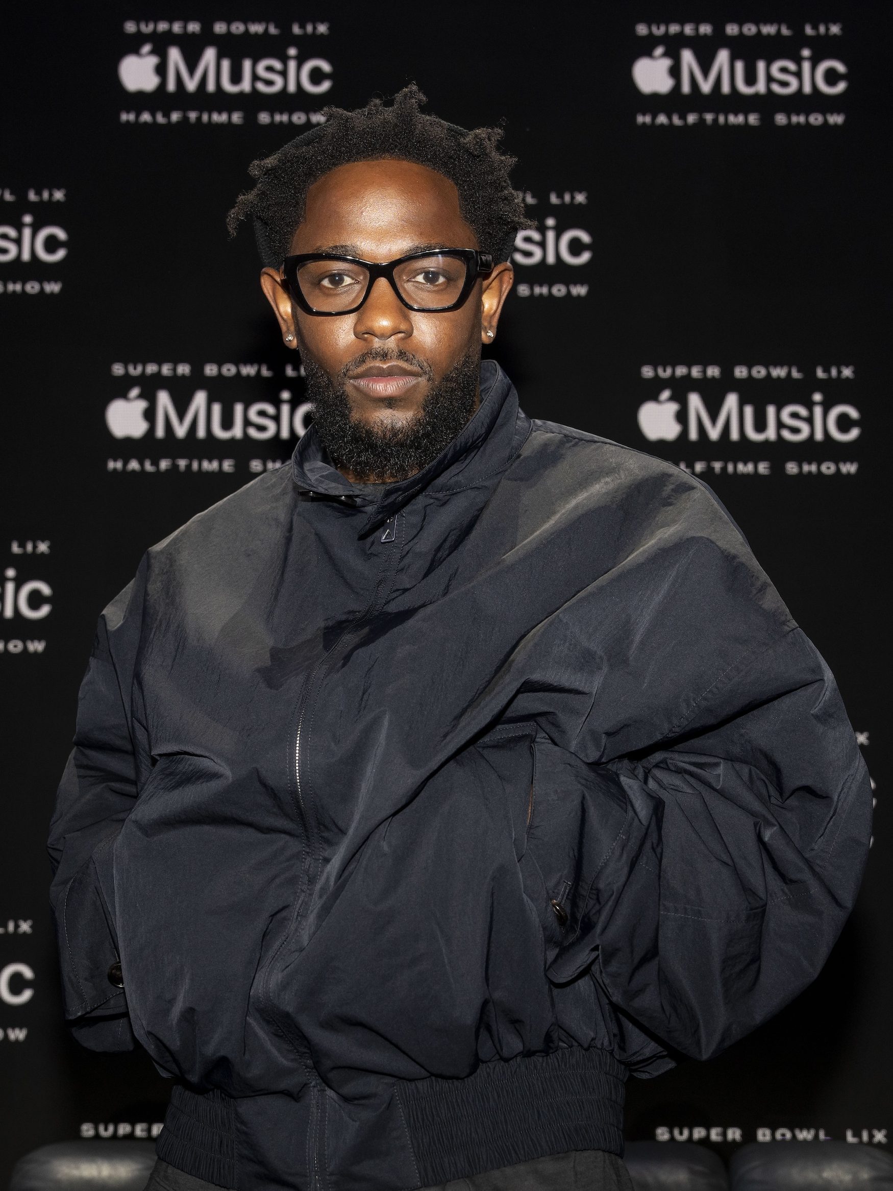 NEW ORLEANS, LOUISIANA - FEBRUARY 06:  Kendrick Lamar pose for a photo onstage at the Super Bowl LVIX Pregame & Apple Music Super Bowl LVIX Halftime Show Press Conference at Ernest N. Morial Convention Center on February 06, 2025 in New Orleans, Louisiana.  (Photo by Michael Owens/Getty Images)